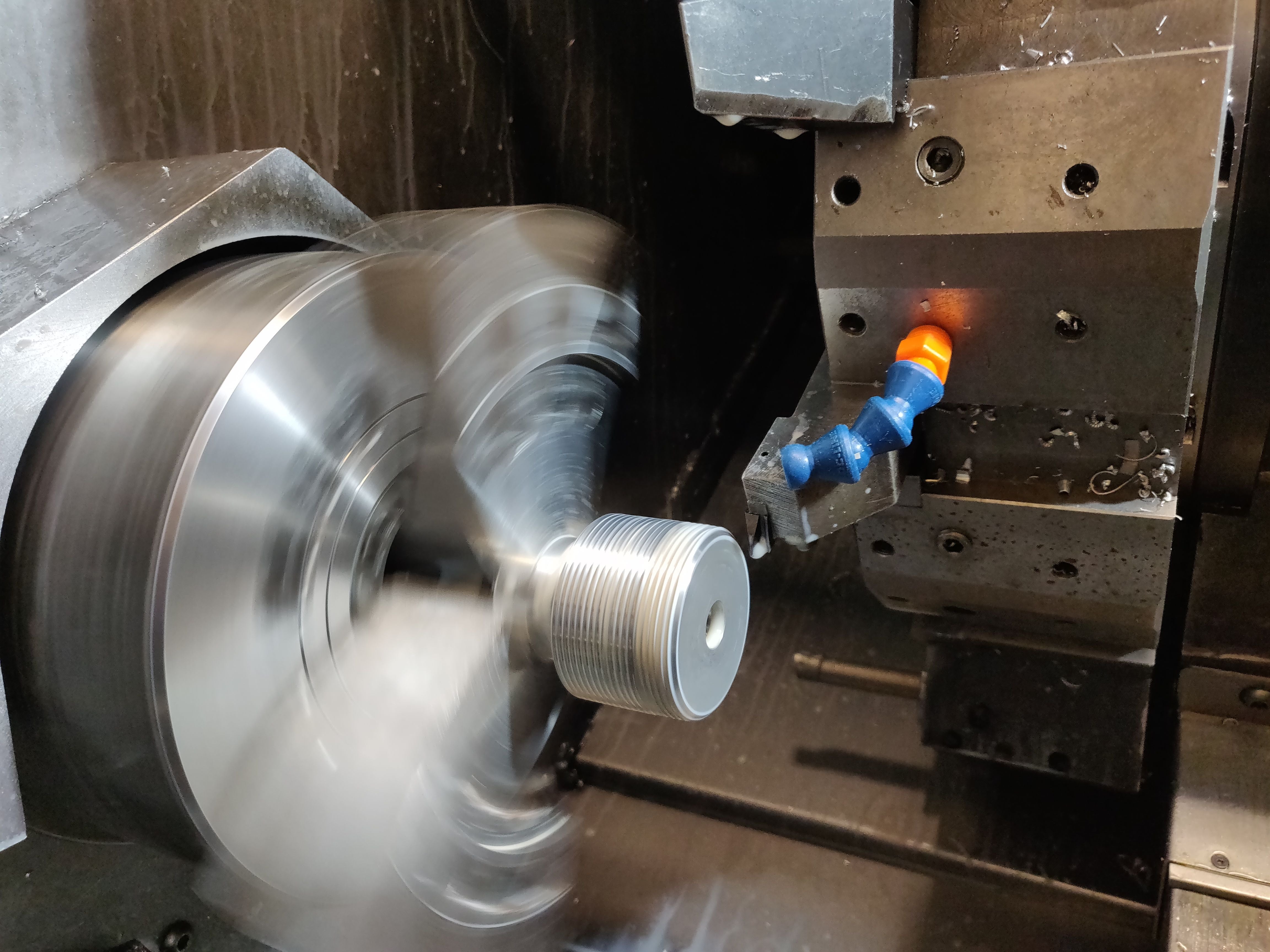 Part being turned on our in-house CNC lathe