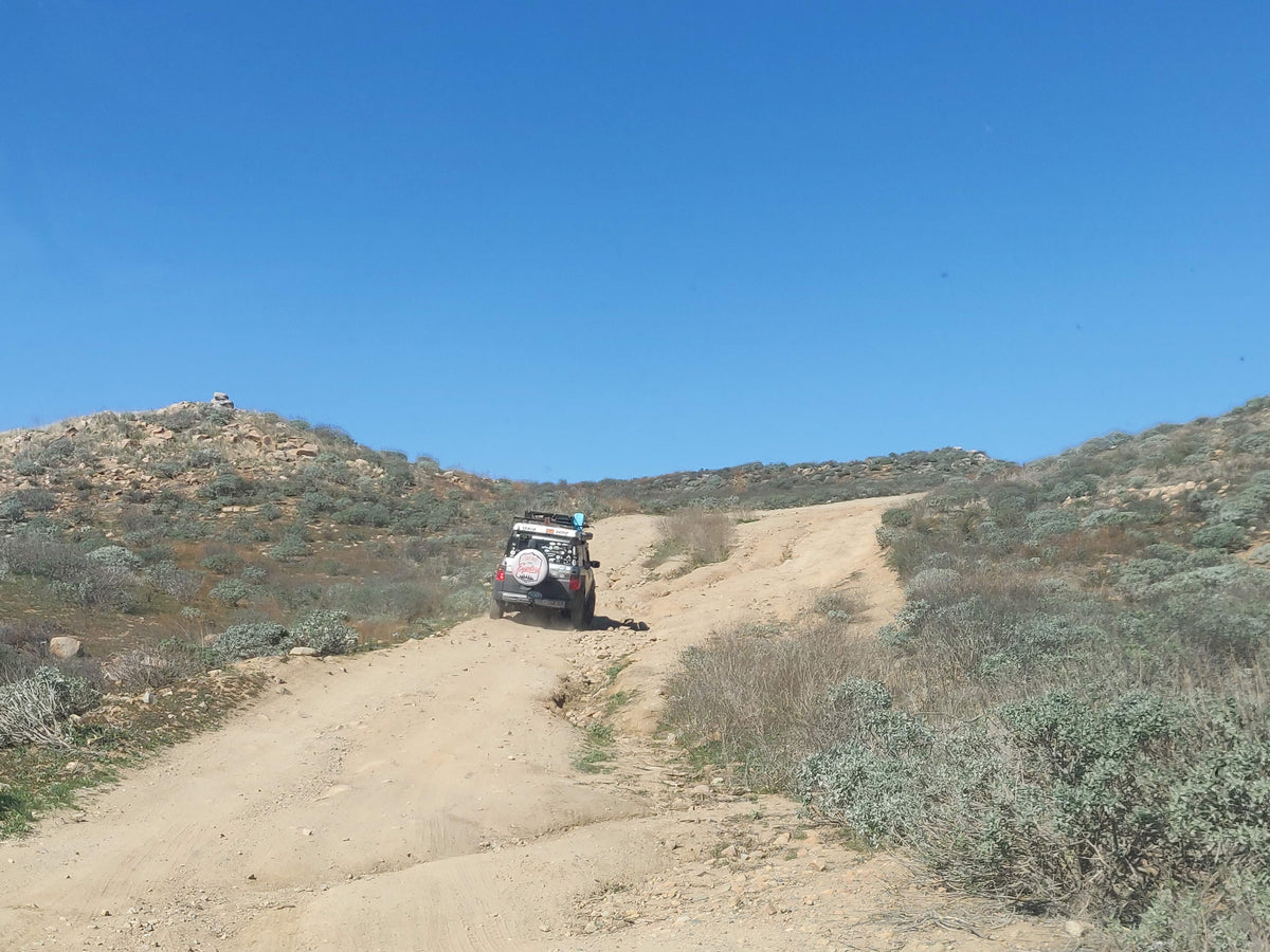 Lifted Honda Element with roof rack on desert trail – Aerogenics off-road parts